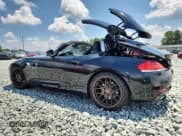 ✅ 2011 BMW Z4 sDrive35i • VIN: WBALM7C55BE383650 • Lot: 66361665. Listed on Copart with 127,361 mi. Free auction sales archive from the USA and detailed vehicle history report at DreamBid. Image 2.