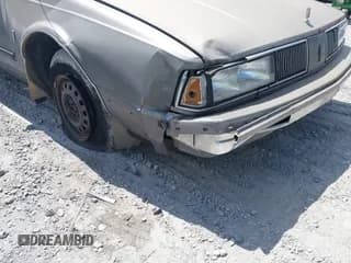 ✅ 1988 Oldsmobile Delta • VIN: 1G3HN14C7JW410839 • Лот: 42691147. Опубликован ранее на IAAI с пробегом 124 911 миль. Бесплатный доступ к архиву аукционных продаж из США и подробный отчёт об истории автомобиля на DreamBid. Изображение 6.
