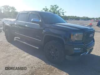 ✅ 2017 GMC Sierra 1500 Denali • VIN: 3GTU2PEC1HG116323 • Lot: 42071222. Listed on IAAI with 80,083 mi. Free auction sales archive from the USA and detailed vehicle history report at DreamBid. Image 1.