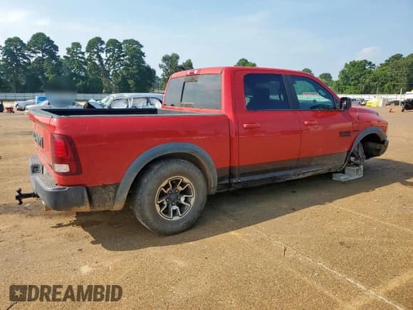 ✅ 2016 Ram 1500 Rebel • VIN: 1C6RR7YT7GS296256 • Лот: 69448335. Опубликован ранее на Copart с пробегом 119 448 миль. Бесплатный доступ к архиву аукционных продаж из США и подробный отчёт об истории автомобиля на DreamBid. Изображение 3.