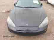 2007 Hyundai Tiburon GT z VIN KMHHN66F37U250320, wystawiony jako IAAI lot #42047654 z przebiegiem 231 899 mil mil oraz . Historia ofert i sprzedaży dostępna na DreamBid. Obrazek 6.