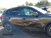 ✅ 2016 Mazda CX-5 Grand Touring • VIN: JM3KE4DY6G0742535 • Lot: 43402645. Wystawiony na IAAI z przebiegiem 130 732 mil. Bezpłatny archiwum sprzedaży aukcyjnych z USA i szczegółowy raport historii pojazdu na DreamBid. Zdjęcie 13.