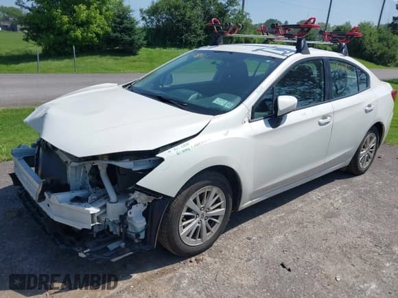 ✅ 2017 Subaru Impreza Premium • VIN: 4S3GKAB64H3614740 • Lot: 42568465. Listed on IAAI with 166,340 mi. Free auction sales archive from the USA and detailed vehicle history report at DreamBid. Image 18.