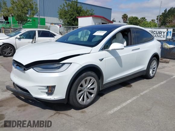 ✅ 2021 Tesla Model X Long Range Plus • VIN: 5YJXCDE27MF322200 • Lot: 42360282. Listed on IAAI with 37,072 mi. Free auction sales archive from the USA and detailed vehicle history report at DreamBid. Image 2.