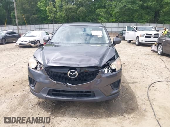 ✅ 2014 Mazda CX-5 Sport • VIN: JM3KE2BE5E0350057 • Lot: 42145910. Listed on IAAI with 157,517 mi. Free auction sales archive from the USA and detailed vehicle history report at DreamBid. Image 6.