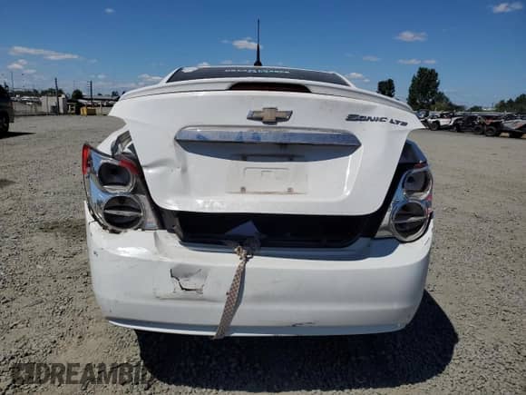 2014 Chevrolet Sonic LTZ с VIN 1G1JE5SG0E4123626, выставлен на аукционе Copart как лот 61103254 с пробегом 158 390 миль миль и Списание • Salvage title. История ставок и продаж доступна на DreamBid. Изображение 6.