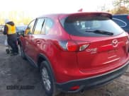 ✅ 2016 Mazda CX-5 Sport • VIN: JM3KE4BY3G0602140 • Lot: 43855403. Listed on IAAI with 169,571 mi. Free auction sales archive from the USA and detailed vehicle history report at DreamBid. Image 3.