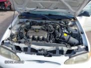 ✅ 1998 Ford Escort SE • VIN: 3FAFP15P1WR237676 • Lot: 41238541. Wystawiony na IAAI z przebiegiem 77 139 mil. Bezpłatny archiwum sprzedaży aukcyjnych z USA i szczegółowy raport historii pojazdu na DreamBid. Zdjęcie 10.