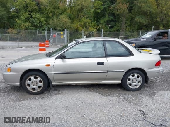 ✅ 1999 Subaru Impreza L • VIN: JF1GM4353XH400119 • Lot: 43180916. Listed on IAAI with 212,567 mi. Free auction sales archive from the USA and detailed vehicle history report at DreamBid. Image 14.