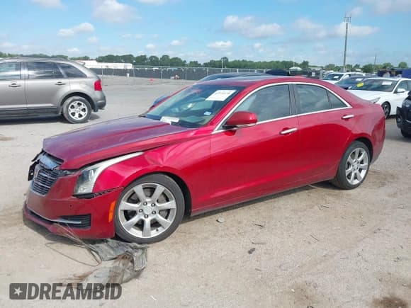✅ 2015 Cadillac ATS Luxury RWD • VIN: 1G6AB5RA2F0121860 • Lot: 42574138. Listed on IAAI with 69,548 mi. Free auction sales archive from the USA and detailed vehicle history report at DreamBid. Image 2.