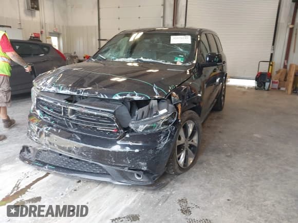 ✅ 2014 Dodge Durango R/T • VIN: 1C4SDJCT3EC971265 • Lot: 42570149. Listed on IAAI with 97,832 mi. Free auction sales archive from the USA and detailed vehicle history report at DreamBid. Image 2.