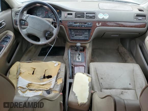 ✅ 1998 Acura TL • VIN: JH4UA3645WC003055 • Лот: 79900284. Опубликован ранее на Copart с пробегом 119 525 миль. Бесплатный доступ к архиву аукционных продаж из США и подробный отчёт об истории автомобиля на DreamBid. Изображение 8.