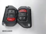 ✅ 2023 Jeep Wrangler Sahara • VIN: 1C4HJXEG5PW581632 • Lot: 42462622. Listed on IAAI with 24,550 mi. Free auction sales archive from the USA and detailed vehicle history report at DreamBid. Image 11.