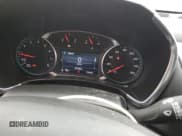 ✅ 2021 Chevrolet Equinox LT • VIN: 2GNAXUEV1M6144298 • Lot: 58198095. Listed on Copart with 97,702 mi. Free auction sales archive from the USA and detailed vehicle history report at DreamBid. Image 9.