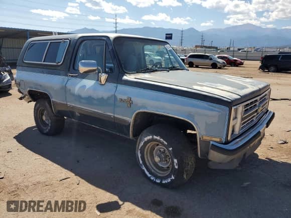 1987 Chevrolet Blazer z VIN 1GNEV18K7HF180306, wystawiony jako Copart lot #80914465 z przebiegiem 455 897 mil mil oraz Nie do naprawy • Non repairable. Historia ofert i sprzedaży dostępna na DreamBid. Obrazek 4.