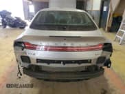 ✅ 2013 Lincoln MKZ Hybrid • VIN: 3LN6L2LU2DR800120 • Lot: 45345875. Wystawiony na Copart z przebiegiem Nie podano. Bezpłatny archiwum sprzedaży aukcyjnych z USA i szczegółowy raport historii pojazdu na DreamBid. Zdjęcie 6.