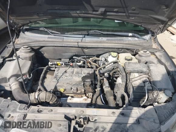 2015 Chevrolet Cruze LT z VIN 1G1PC5SBXF7250176, wystawiony jako IAAI lot #43239036 z przebiegiem 155 045 mil mil oraz . Historia ofert i sprzedaży dostępna na DreamBid. Obrazek 10.