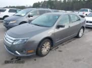 ✅ 2011 Ford Fusion Hybrid • VIN: 3FADP0L33BR116627 • Lot: 43911282. Listed on IAAI with 147,176 mi. Free auction sales archive from the USA and detailed vehicle history report at DreamBid. Image 2.