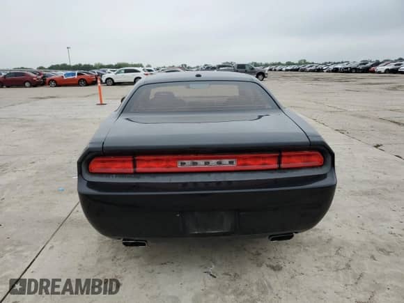 2014 Dodge Challenger SXT 100th Anniversary z VIN 2C3CDYAG9EH231854, wystawiony jako Copart lot #54427705 z przebiegiem 211 763 mil mil oraz Czysty tytuł • Clean title. Historia ofert i sprzedaży dostępna na DreamBid. Obrazek 6.