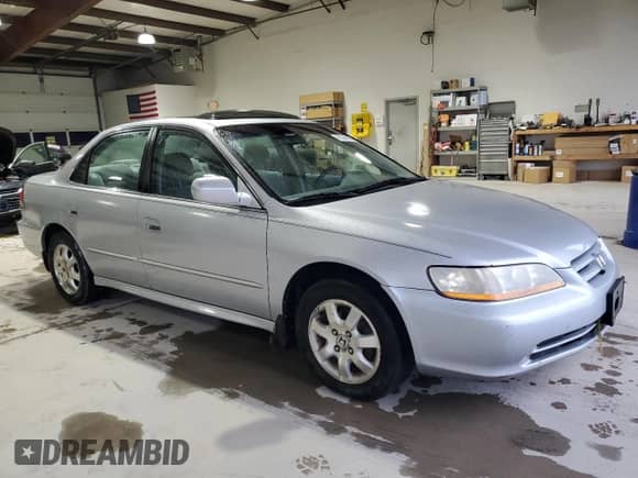 2001 Honda Accord EX с VIN 1HGCG56621A018370, выставлен на аукционе Copart как лот 81444985 с пробегом 113 403 миль миль и Списание • Salvage title. История ставок и продаж доступна на DreamBid. Изображение 4.