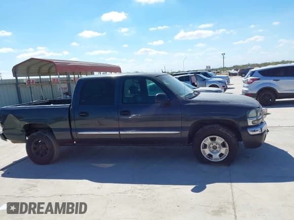 ✅ 2004 GMC Sierra 1500 SLE • VIN: 2GTEC13T041317893 • Lot: 43428782. Listed on IAAI with 229,839 mi. Free auction sales archive from the USA and detailed vehicle history report at DreamBid. Image 13.