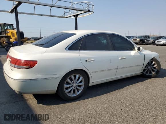 ✅ 2006 Hyundai Azera SE • VIN: KMHFC46F46A080437 • Lot: 81836775. Listed on Copart with 219,908 mi. Free auction sales archive from the USA and detailed vehicle history report at DreamBid. Image 3.
