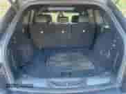 2018 Jeep Grand Cherokee Sterling z VIN 1C4RJFBG8JC162167, wystawiony jako Copart lot #91731335 z przebiegiem 128 078 mil mil oraz Czysty tytuł • Clean title. Historia ofert i sprzedaży dostępna na DreamBid. Obrazek 14.