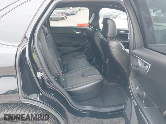 ✅ 2022 Ford Edge ST • VIN: 2FMPK4AP9NBA64874 • Lot: 42627392. Wystawiony na IAAI z przebiegiem 77 436 mil. Bezpłatny archiwum sprzedaży aukcyjnych z USA i szczegółowy raport historii pojazdu na DreamBid. Zdjęcie 8.