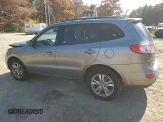 ✅ 2012 Hyundai Santa Fe SE • VIN: 5XYZHDAGXCG133740 • Lot: 76651064. Listed on Copart with 90,186 mi. Free auction sales archive from the USA and detailed vehicle history report at DreamBid. Image 2.