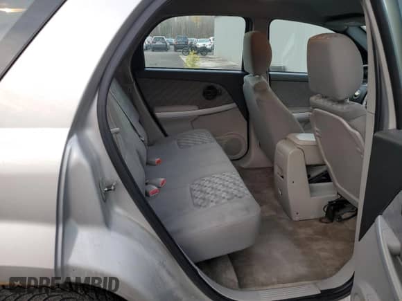 2007 Chevrolet Equinox LS z VIN 2CNDL13F476079703, wystawiony jako Copart lot #77136034 z przebiegiem 155 445 mil mil oraz Czysty tytuł • Clean title. Historia ofert i sprzedaży dostępna na DreamBid. Obrazek 11.