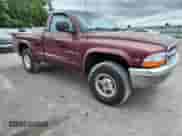 2000 Dodge Dakota Sport z VIN 1B7GG26N5YS650791, wystawiony jako Copart lot #63601765 z przebiegiem 80 841 mil mil oraz Szkoda całkowita • Salvage title. Historia ofert i sprzedaży dostępna na DreamBid. Obrazek 4.