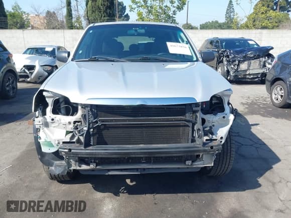 ✅ 2006 Mazda Tribute i • VIN: 4F2YZ02Z26KM38777 • Lot: 41673856. Listed on IAAI with 165,665 mi. Free auction sales archive from the USA and detailed vehicle history report at DreamBid. Image 13.