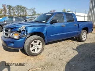2008 Dodge Dakota SXT with VIN 1D7HE38K78S628610, listed as a Copart auction lot 74061034 with 132,707 mi miles and Salvage title. Bid and sale history available at DreamBid. Image 1.