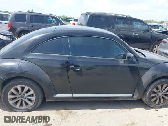 ✅ 2014 Volkswagen Beetle Entry • VIN: 3VWF17AT2EM641841 • Лот: 42538506. Опубликован ранее на IAAI с пробегом 177 253 миль. Бесплатный доступ к архиву аукционных продаж из США и подробный отчёт об истории автомобиля на DreamBid. Изображение 13.