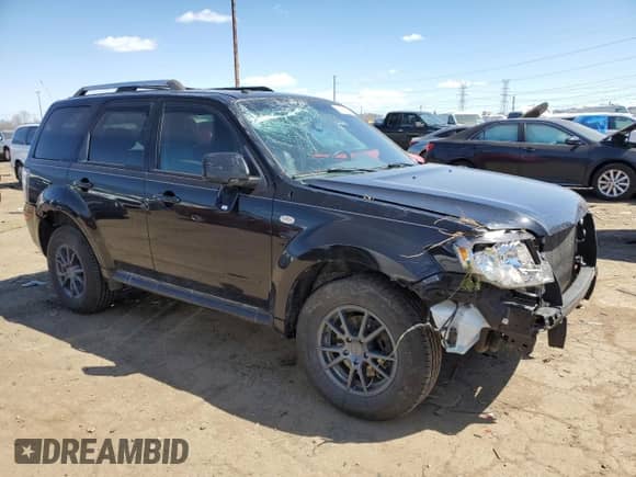 2009 Mercury Mariner Premier with VIN 4M2CU97719KJ08051, listed as a Copart auction lot 53328965 with 98,229 mi miles and Clean title. Bid and sale history available at DreamBid. Image 4.