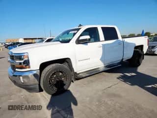 2016 Chevrolet Silverado 1500 LT z VIN 3GCUKREC4GG318003, wystawiony jako Copart lot #85576835 z przebiegiem 166 692 mil mil oraz Czysty tytuł • Clean title. Historia ofert i sprzedaży dostępna na DreamBid. Obrazek 1.