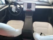 ✅ 2025 Tesla Model Y Long Range • VIN: 7SAYGDEE2SA346694 • Lot: 81201915. Listed on Copart with 24,827 mi. Free auction sales archive from the USA and detailed vehicle history report at DreamBid. Image 8.