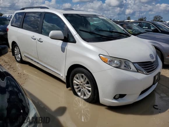 ✅ 2015 Toyota Sienna XLE • VIN: 5TDYK3DC4FS647039 • Lot: 74076584. Listed on Copart with Not provided. Free auction sales archive from the USA and detailed vehicle history report at DreamBid. Image 4.