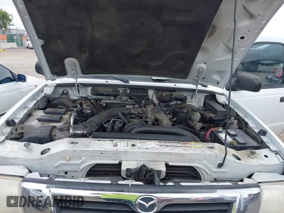 ✅ 2000 Mazda B-Series SX • VIN: 4F4YR12C3YTM25283 • Lot: 42646355. Listed on IAAI with 70,534 mi. Free auction sales archive from the USA and detailed vehicle history report at DreamBid. Image 10.