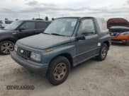 ✅ 1994 Geo Tracker • VIN: 2CNBE18U1R6918878 • Lot: 75894834. Listed on Copart with Not provided. Free auction sales archive from the USA and detailed vehicle history report at DreamBid. Image 1.