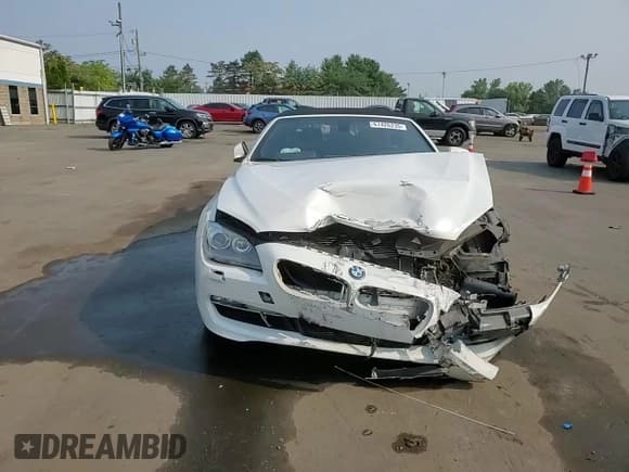 ✅ 2012 BMW 6 Series 650i xDrive • VIN: WBALZ5C55CC619720 • Лот: 67426235. Опубликован ранее на Copart с пробегом 102 164 миль. Бесплатный доступ к архиву аукционных продаж из США и подробный отчёт об истории автомобиля на DreamBid. Изображение 13.