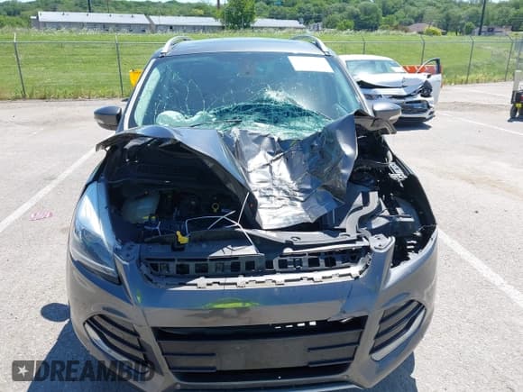 ✅ 2015 Ford Escape Titanium • VIN: 1FMCU9J92FUB01007 • Lot: 42319246. Listed on IAAI with 90,782 mi. Free auction sales archive from the USA and detailed vehicle history report at DreamBid. Image 13.