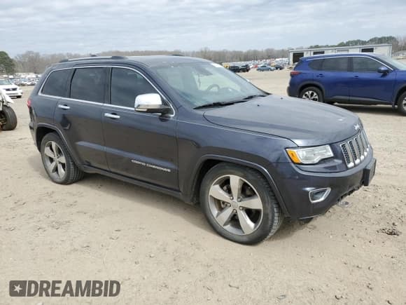 ✅ 2015 Jeep Grand Cherokee Overland • VIN: 1C4RJFCG1FC115844 • Lot: 47490555. Listed on Copart with 215,263 mi. Free auction sales archive from the USA and detailed vehicle history report at DreamBid. Image 4.