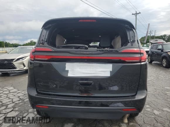 ✅ 2024 Chrysler Pacifica Touring L • VIN: 2C4RC1BG4RR100992 • Lot: 60261375. Wystawiony na Copart z przebiegiem Nie podano. Bezpłatny archiwum sprzedaży aukcyjnych z USA i szczegółowy raport historii pojazdu na DreamBid. Zdjęcie 6.