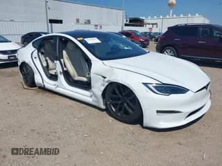 ✅ 2022 Tesla Model S • VIN: 5YJSA1E54NF488913 • Lot: 43126568. Listed on IAAI with 11,716 mi. Free auction sales archive from the USA and detailed vehicle history report at DreamBid. Image 1.