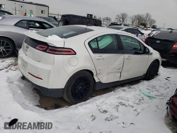 2015 Chevrolet Volt z VIN 1G1RB6E40FU112050, wystawiony jako Copart lot #37900524 z przebiegiem 112 878 mil mil oraz . Historia ofert i sprzedaży dostępna na DreamBid. Obrazek 3.