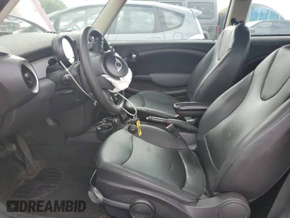 2012 MINI Hardtop with VIN WMWSU3C53CT260060, listed as a Copart auction lot 63656395 with 100,537 mi miles and Clean title. Bid and sale history available at DreamBid. Image 7.