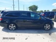 ✅ 2011 Honda Odyssey Touring • VIN: 5FNRL5H94BB508457 • Lot: 42607918. Listed on IAAI with 490,827 mi. Free auction sales archive from the USA and detailed vehicle history report at DreamBid. Image 13.