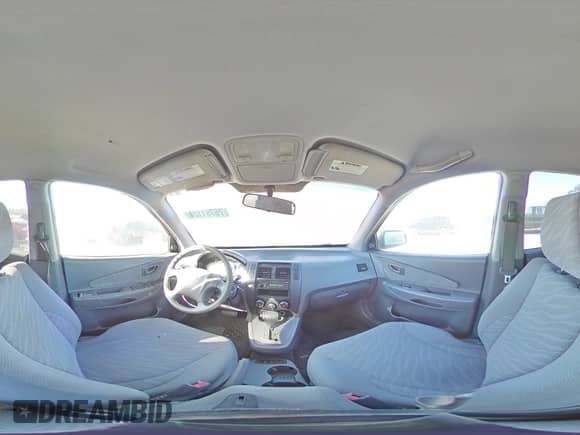 2005 Hyundai Tucson GL z VIN KM8JM12BX5U102835, wystawiony jako Copart lot #76761124 z przebiegiem 194 020 mil mil oraz Szkoda całkowita • Salvage title. Historia ofert i sprzedaży dostępna na DreamBid. Obrazek 13.