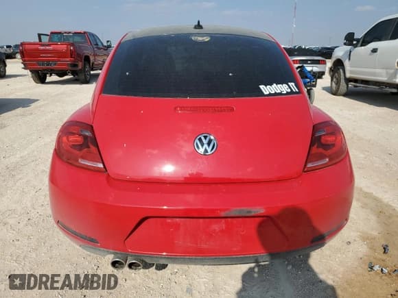 ✅ 2014 Volkswagen Beetle 2.0L TDI • VIN: 3VWJL7AT8EM608802 • Лот: 64646604. Опубликован ранее на Copart с пробегом 70 894 миль. Бесплатный доступ к архиву аукционных продаж из США и подробный отчёт об истории автомобиля на DreamBid. Изображение 6.
